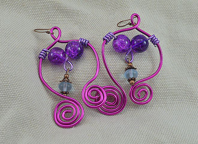 Boucles d'oreille newsletter 18