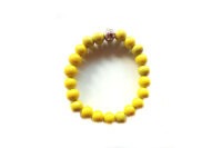 Bracelet en perles de verre jaune mat