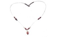 Collier en fil avec perle centrale violette "fleurie"