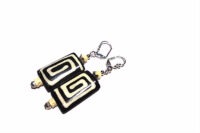 Boucles en corne noire incrustée en blanc